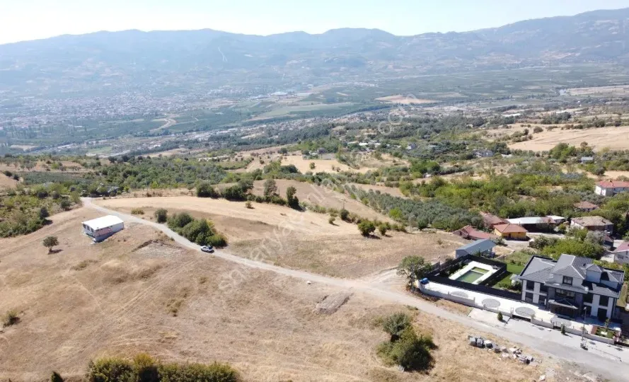 DÜZAKÇAŞEHİR MAH. 2338 m² İMARA SINIR, RESMİ YOLA CEPHELİ TAM YATIRIMLIK ARAZİ